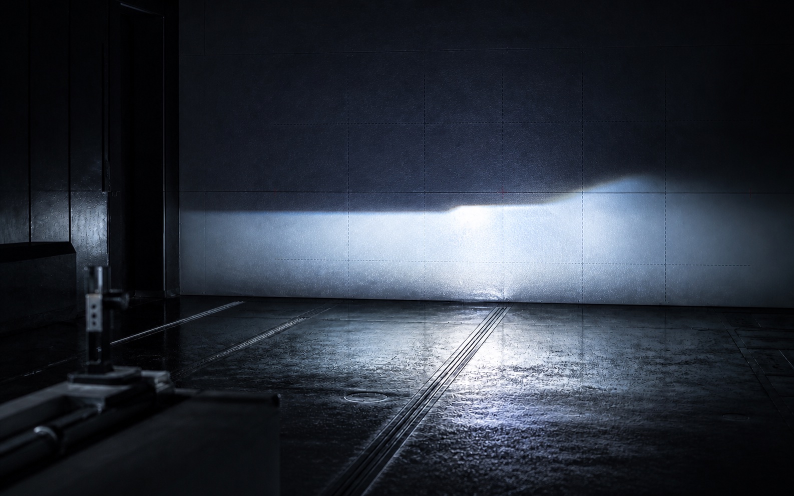 6000 kelvin cool white controlled beam with visible wet-road reflection